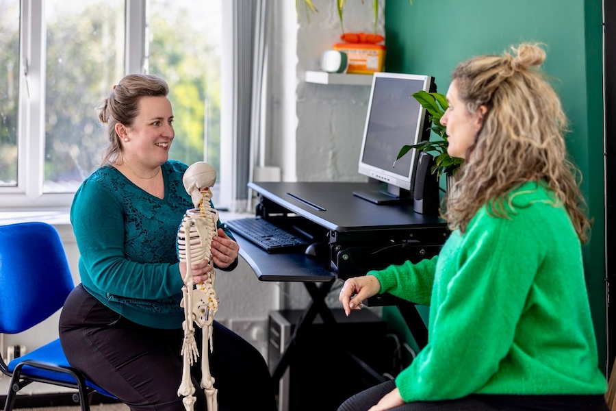 Family Chiropractic Centre Bradford-on-Avon Bethan chiropractor treatment with client 900 Eleanor Hayes Creative & Strategic Director at Webzang